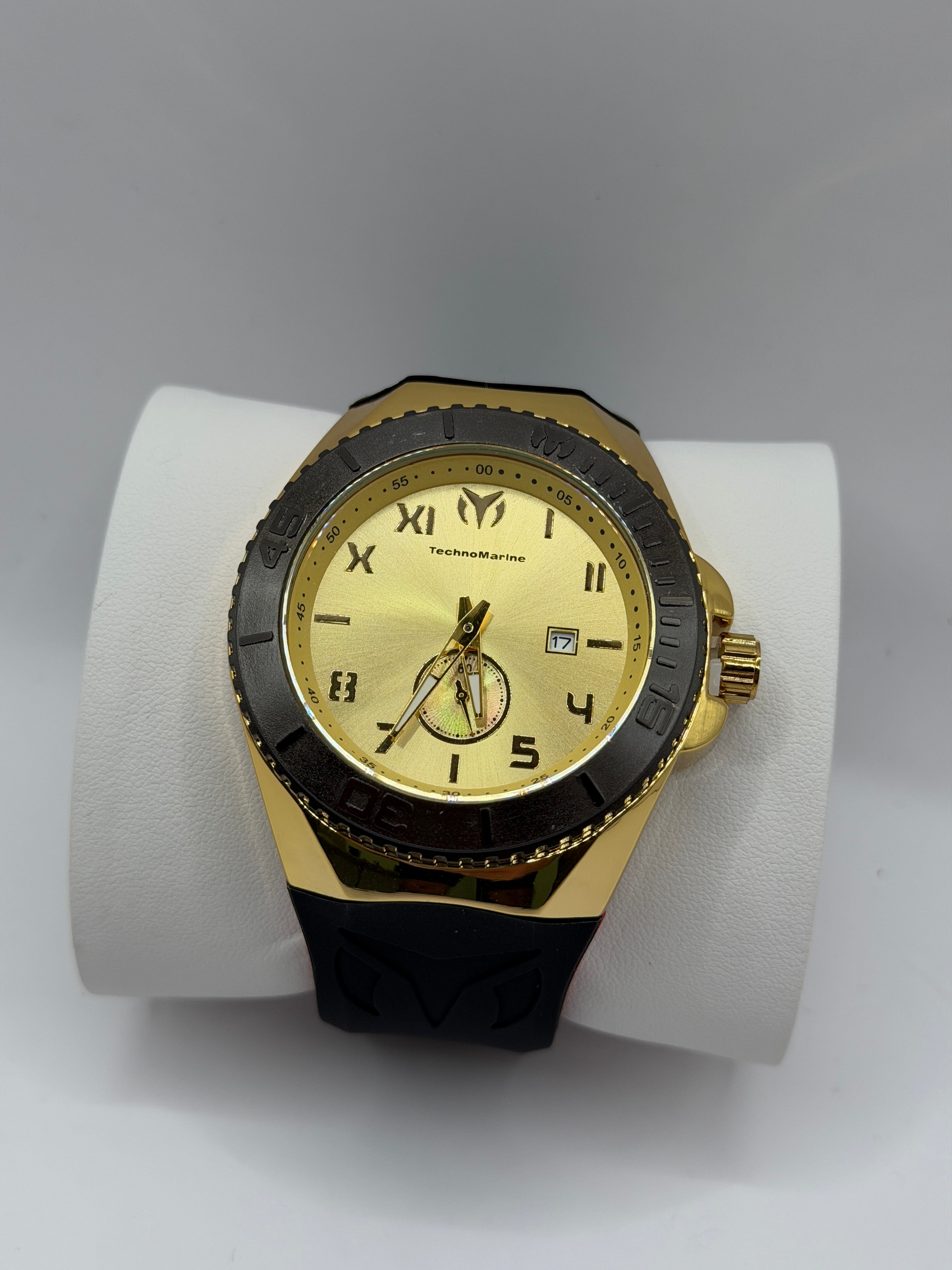 Tchmarin Manta Hombre Dorado Pulso Negro